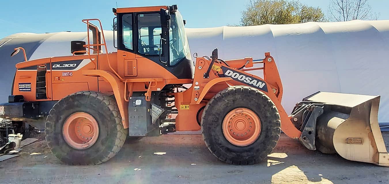 Orange Doosan DL300 wheel loader